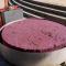 ...das ist der Tresterkuchen (hart wie Beton) der nach der Gährung übrig bleibt und an Brennereien geht.